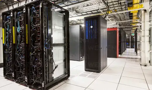 Rows of server racks and network infrastructure